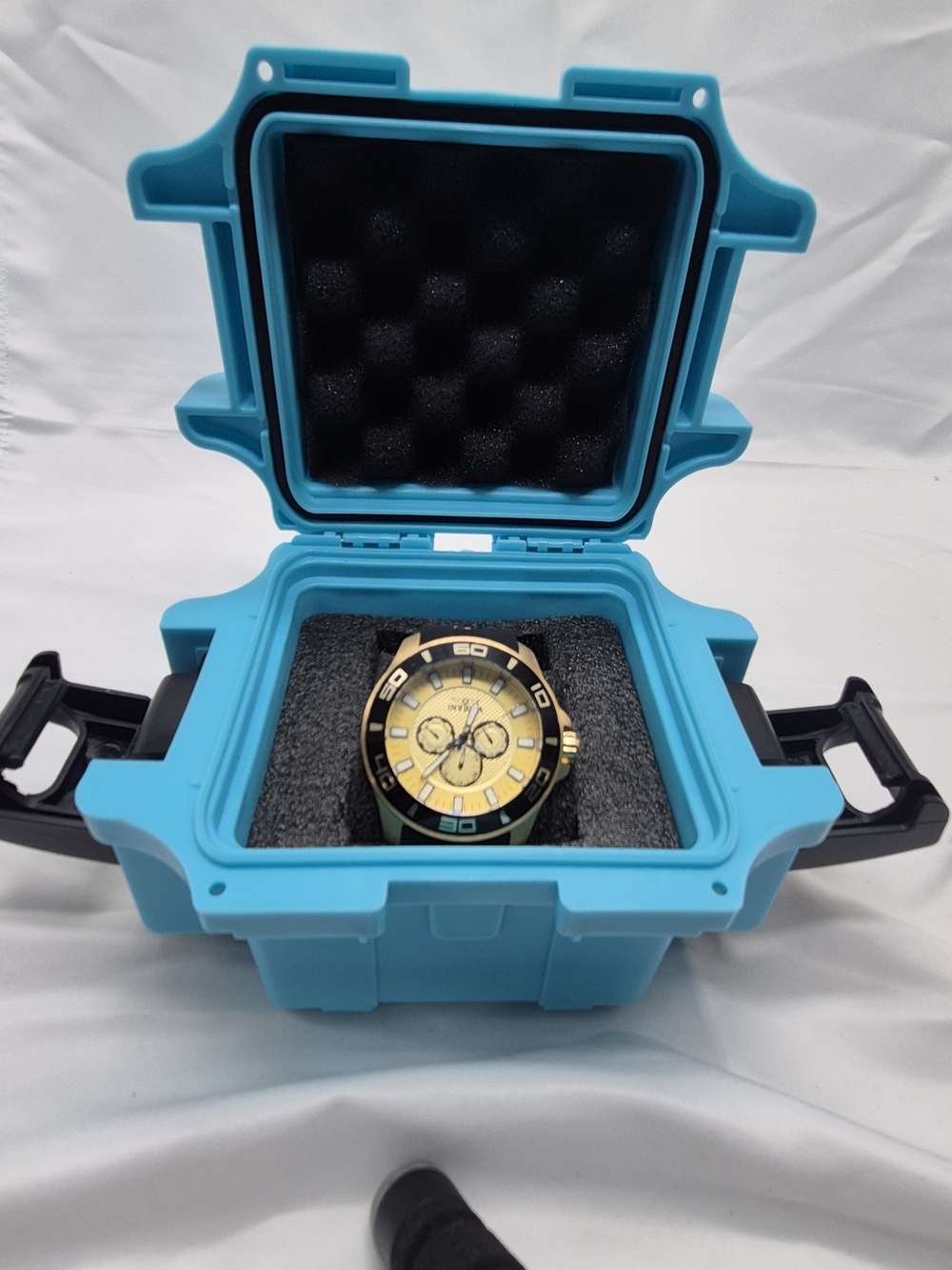 Invicta Gold and Black Chronograph Watch with Turquoise Case